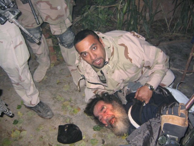 US soldiers capture Saddam Hussein who was executed in 2006.