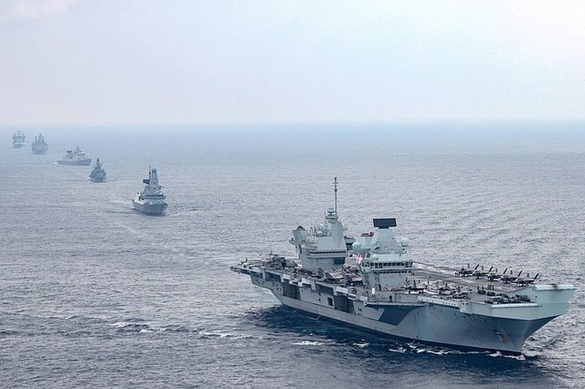 Caption The Royal Navy’s HMS Queen Elizabeth leads the way in the South China Sea 2021 photo by Ministry of Defence.